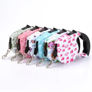 Detail view of colorful patterned retractable pet leashes for dogs and cats