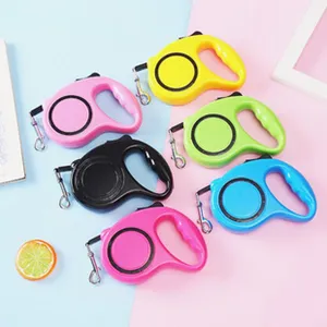Selection of colorful retractable pet leashes with ergonomic handles and metal clasps