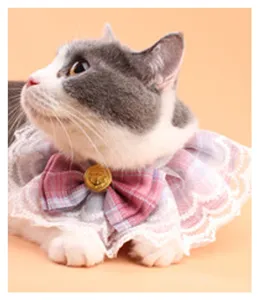 Adorable pink plaid pet collar bib with lace edges and a golden bow button ornament