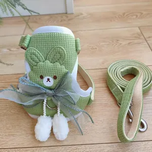Adjustable green waffle-knit pet harness and leash set with cute cartoon bear decoration
