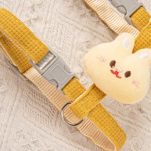 High-quality adjustable yellow pet harness with a cute plush rabbit detail for cats and small dogs