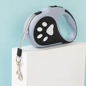 Laisse pour chien rétractable avec lumière LED et motif de patte pour les promenades nocturnes