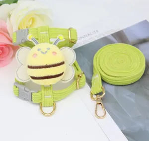Detail of lime green corduroy pet harness with cute bee plush for small dogs and cats