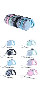 Retractable dog leash available in multiple colors including blue, pink, and mint green
