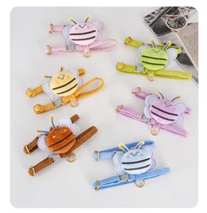 Collection of adjustable cartoon bee cat harnesses in various soft colors for small pets