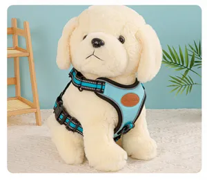 Detailed close-up of a breathable light blue reflective dog harness on a plush model