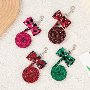 Christmas themed plaid pet leashes with bow ties and snowflake patterns set of 4