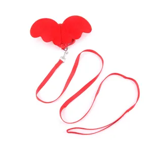 Vibrant red angel wing pet harness and leash set designed for small dogs and cats