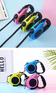 Set of retractable dog leashes in pink yellow and blue vibrant colors for pet walking