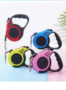 Selection of colorful retractable dog leashes in red, blue, yellow, and pink colors