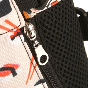 Macro detail of the durable metal zipper and breathable mesh on this portable pet carrier bag