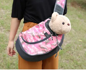 Pink camouflage pet sling carrier bag for outdoor travel with dogs or cats
