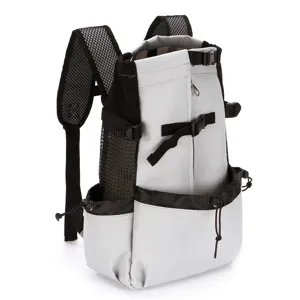 Close-up detail of a breathable grey pet carrier backpack featuring mesh side panels