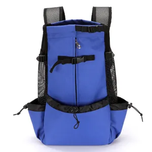Detail view of blue breathable pet carrier backpack with mesh windows and zippers