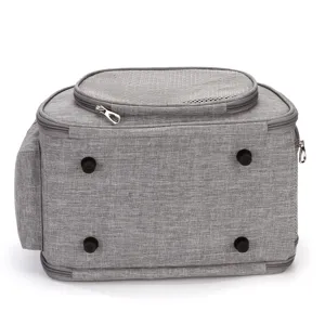 Detail view of foldable grey pet carrier bottom with protective feet and zippers