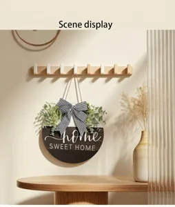 Rustic wooden round door hanger featuring home sweet home text and eucalyptus leaves