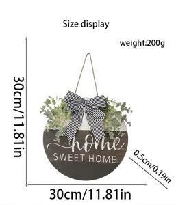 Dimensions of round wooden door hanger with eucalyptus leaves and striped bow decoration.