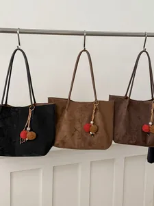 Large capacity minimalist suede tote bags in black and brown featuring pom-pom charms