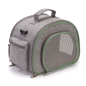 Portable gray pet carrier bag with green trim and breathable mesh for cats and dogs