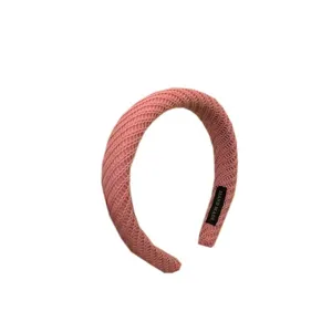 Roze gebreide brede haarband voor vrouwen, stijlvolle vintage accessoire voor dagelijks.