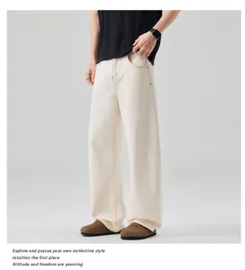 Detailed view of casual off-white wide-leg denim trousers for men, comfortable fit.