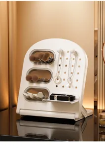 Organizador de escritorio blanco con tablero perforado para brochas de maquillaje y joyas