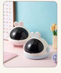 Dos lindos organizadores de escritorio con forma de conejo en rosa y azul, diseño cápsula