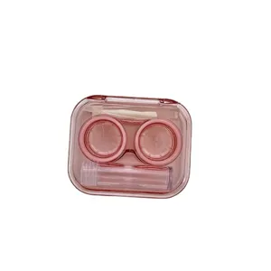 Portable mini transparent pink contact lens case travel kit including tweezers and bottle