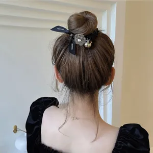 Chouchou de cheveux camélia de luxe vintage coréen avec ruban nœud queue de cheval noire.