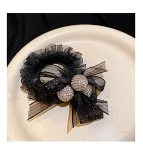 Chouchou en résille noire avec strass, élastique brillant à boule de cristal, accessoire élégant.