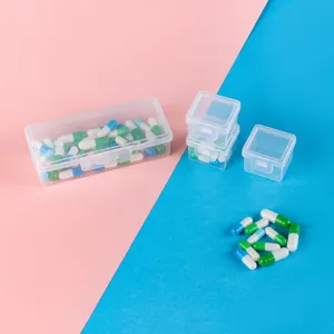 Macro view of mini transparent PP plastic storage boxes featuring flip lids and secure latches