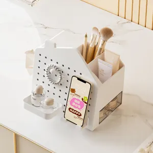 Organisateur de bureau blanc en forme de maison avec panneau perforé et rangements maquillage