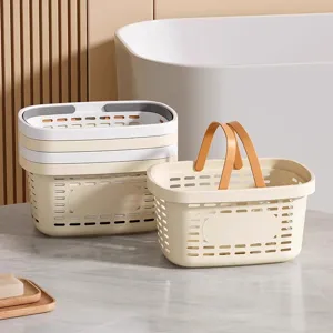 Cream white plastic shower baskets with handles for bathroom storage and organization