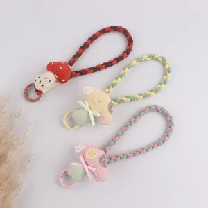 Cute mushroom braided keychain and phone wrist strap, pastoral style candy color charm accessory for girls.