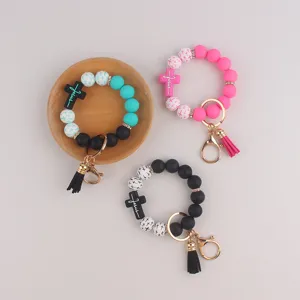 Silikon Perlen Armband Schlüsselanhänger Trendiger Kreuz Anhänger Bunte Perlen Hand Armband Schlüsselanhänger Mit Quaste Für Tägliche Party Unisex Schlüsselring Zubehör