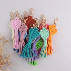 Handmade boho macrame heart tassel keychain bag charm, colorful woven keyring accessory.