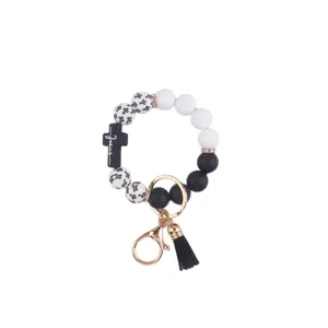 Silicone bead wristlet keychain with cross charm black white fashion keyring tassel accessory