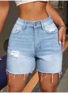 Close-up of high-waisted light blue denim shorts with distressed details and raw hem.