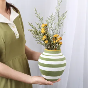 Nordic minimalist hand-painted ceramic vase with green stripes, home decor accent.