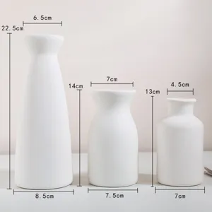 Dimensions détaillées pour trois vases minimalistes en céramique blanche