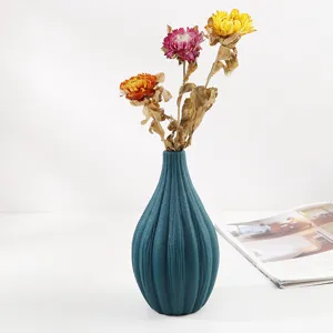 Jarrón de cerámica azul pavo real minimalista nórdico con relieve para flores secas