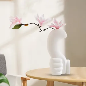 Modern white thumbs up hand gesture ceramic vase with pink magnolia branch decor