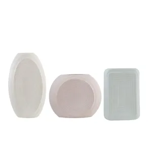 Set of 3 minimalist matte ceramic vases with concentric ring textures for home decor