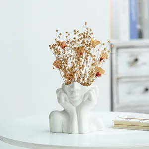 Vase moderne en céramique blanche brillante en forme de visage pour décoration intérieure