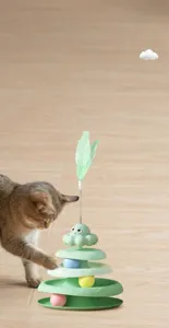Vista dettagliata della giostra per gatti a polpo con piuma e palline colorate