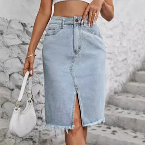 High-waist light blue denim midi skirt with front slit and frayed hem.