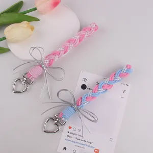 Handgemaakt gevlochten telefoonkoord met zilveren strik, schattige tasbedel accessoire voor dagelijks gebruik.