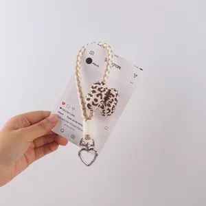 Cute leopard print braided phone lanyard keychain with heart metal clasp for women and girls.