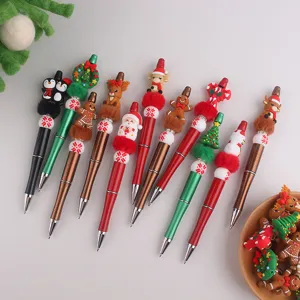 Weihnachten Perlenstift Set mit süßen Silikon Cartoon Aufsätzen und buntem Briefpapier.