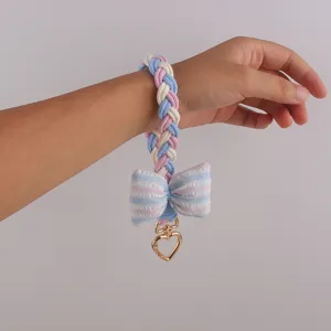 Macaron braided wristlet keychain with striped bow and heart clasp detailed view